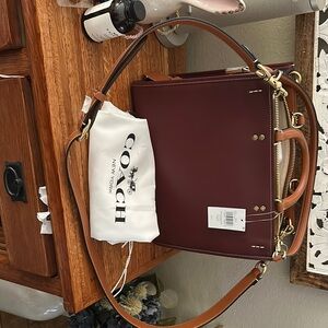 Coach Rogue 30 in color block.